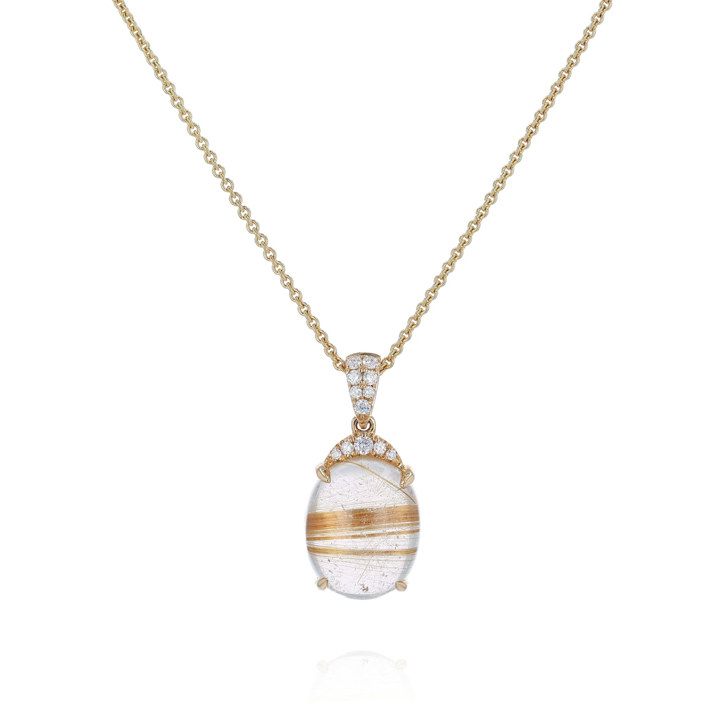 Yellow gold oval rutilated quartz and diamond pendant necklace on a white background
