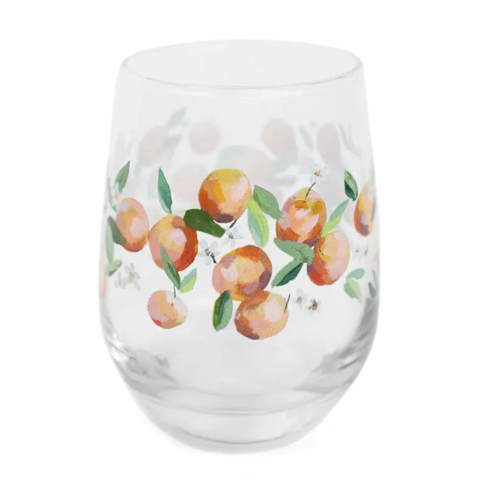 Clear glass with painted oranges and leaves on a white background