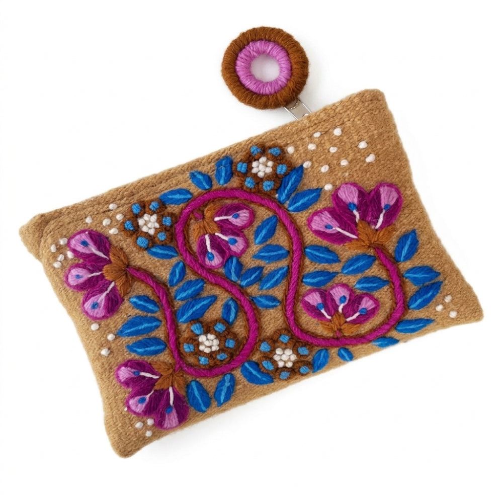 Decorative pouch with floral embroidery on a white background