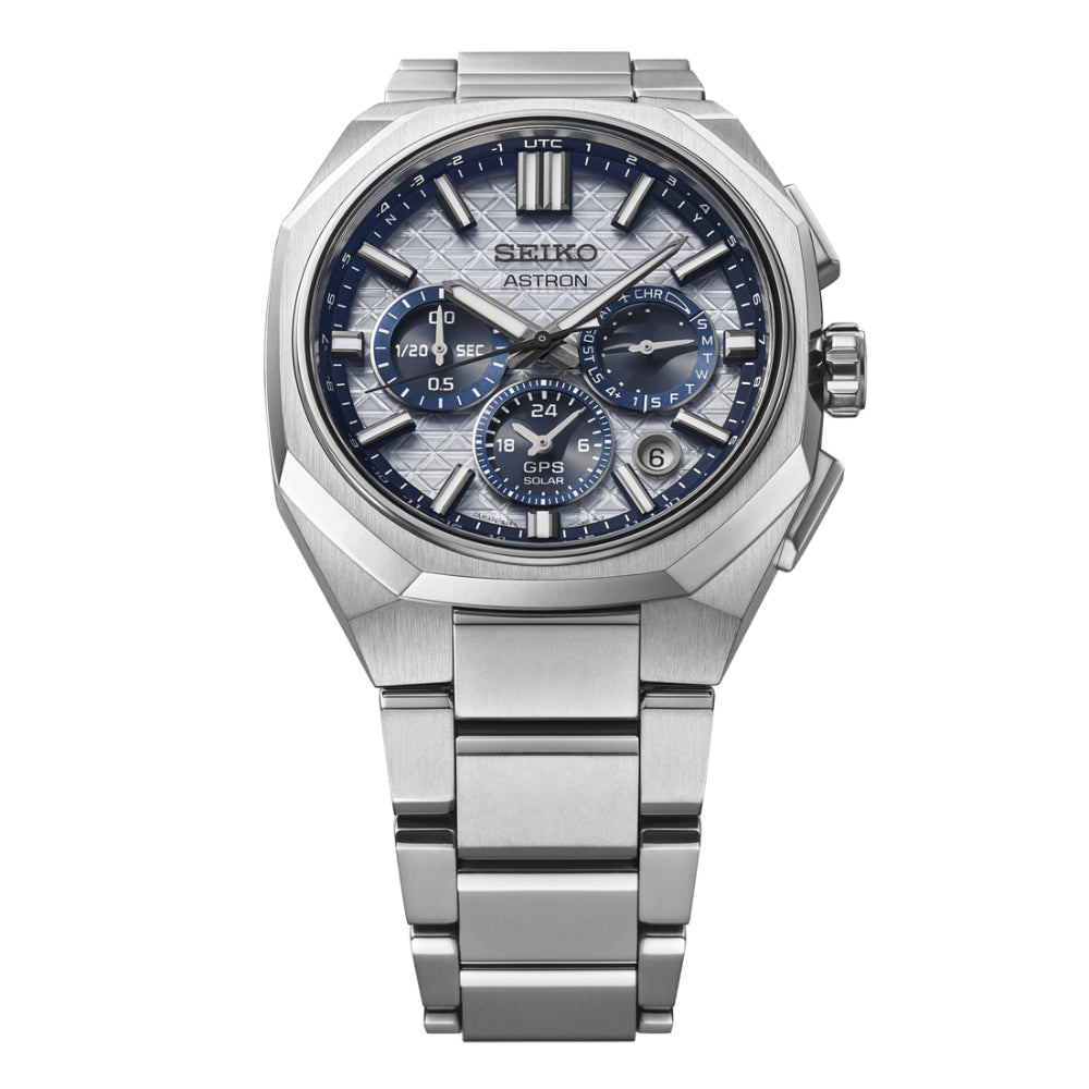 Silver Seiko watch with blue face on a white background