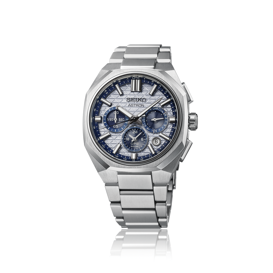 Silver Seiko watch with blue face on a white background