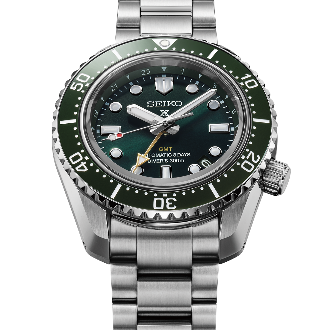 Seiko watch with green bezel and silver bracelet on a white background