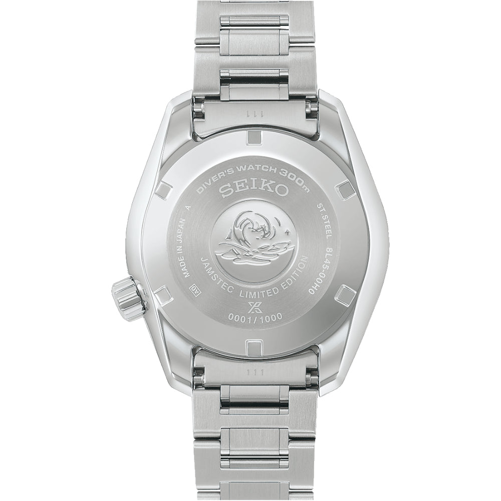 Silver Seiko watch with engraved details on a white background