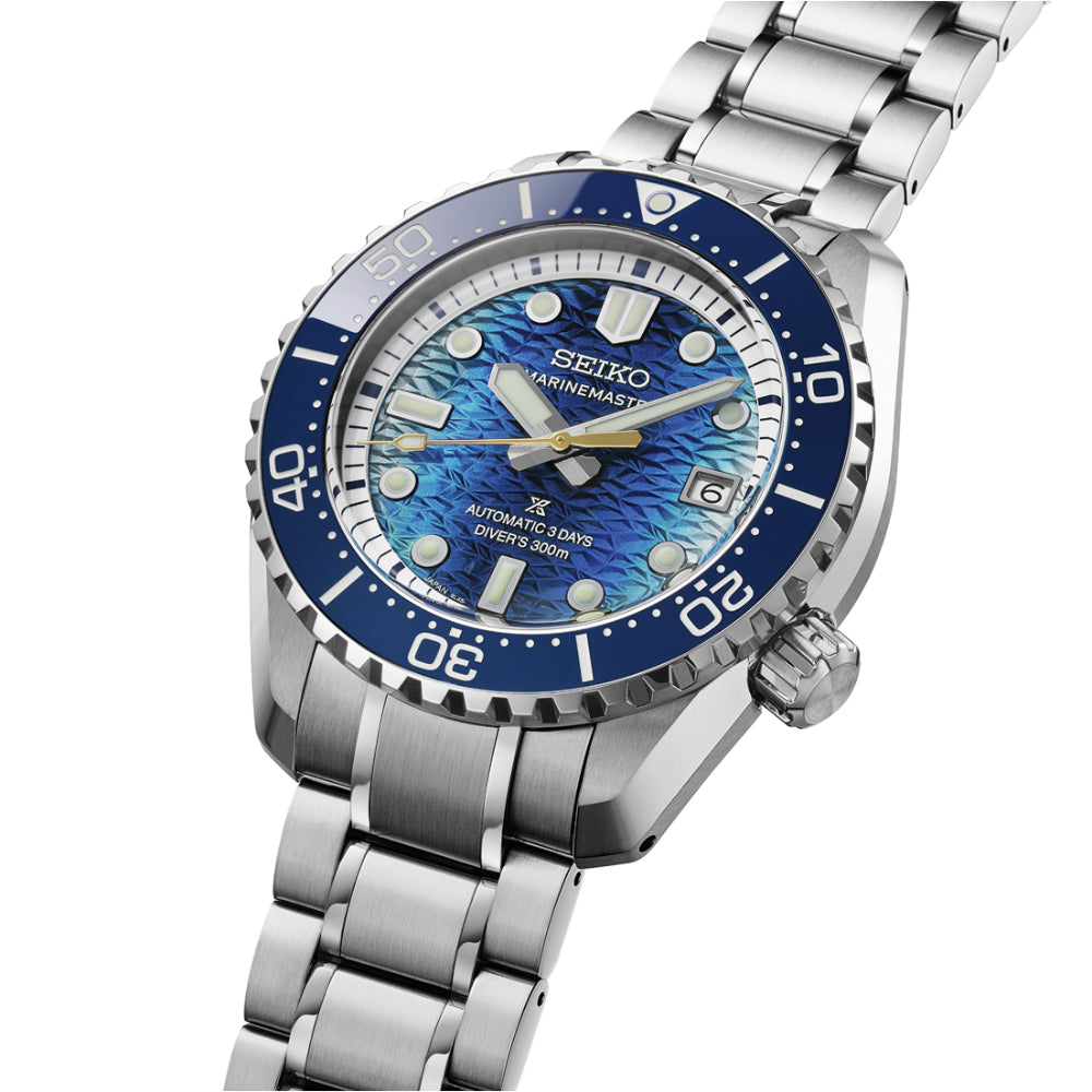 Seiko watch with blue dial and silver metal bracelet on a white background