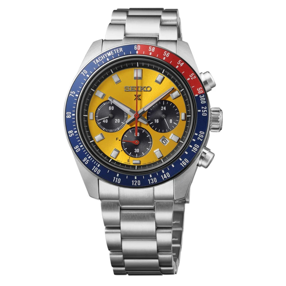 A Seiko stainless steel wristwatch with a yellow dial, a blue and red tachymeter bezel, and a silver metal link bracelet, shown against a plain white background.