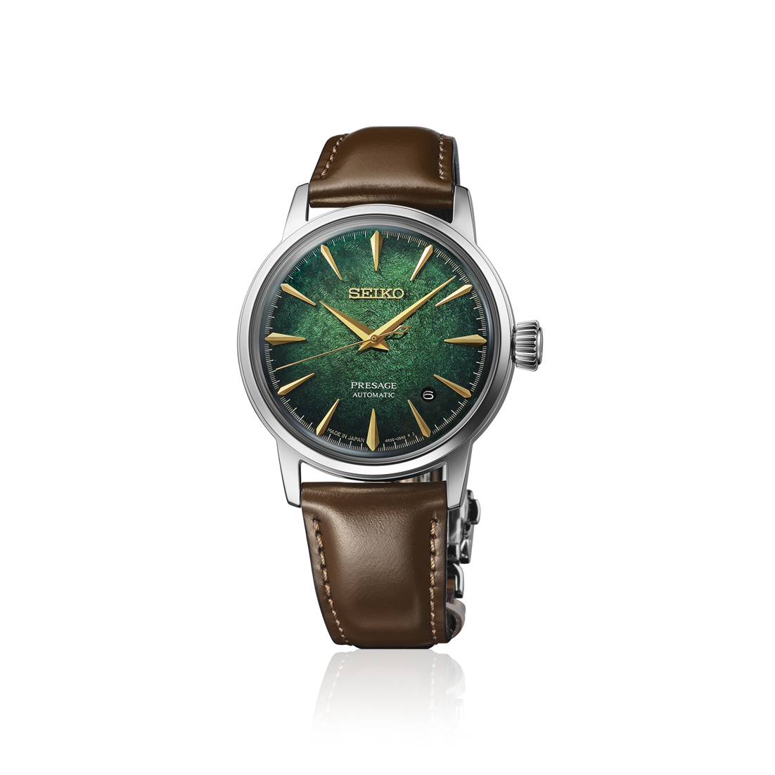watch with green dial and brown strap on white background