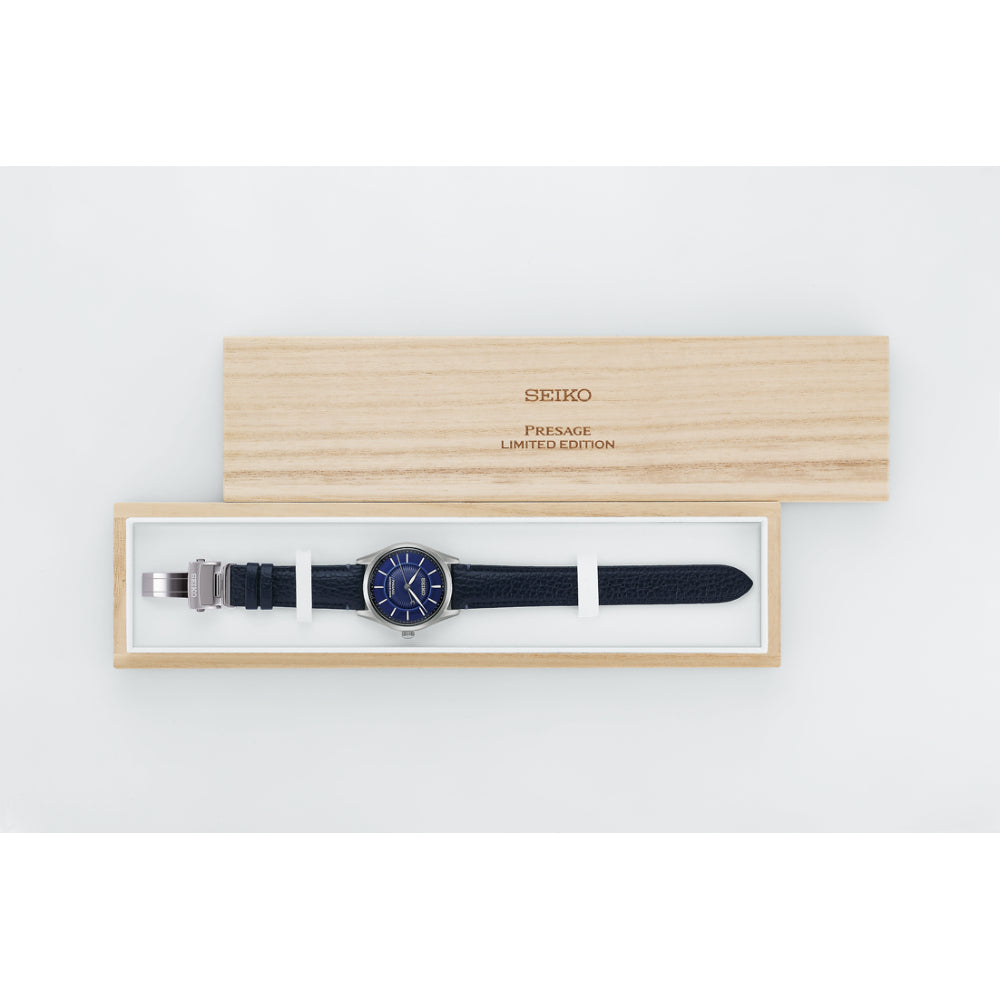 Seiko watch in a wooden box on a white background