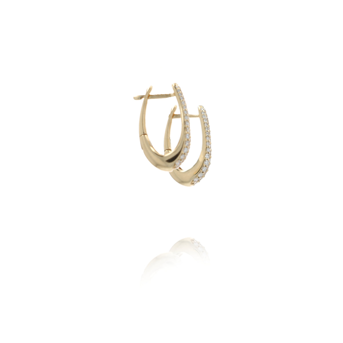 Side view of A pair of gold huggie hoop earrings with pave set stones, shown on a clean white background with a soft reflection below.