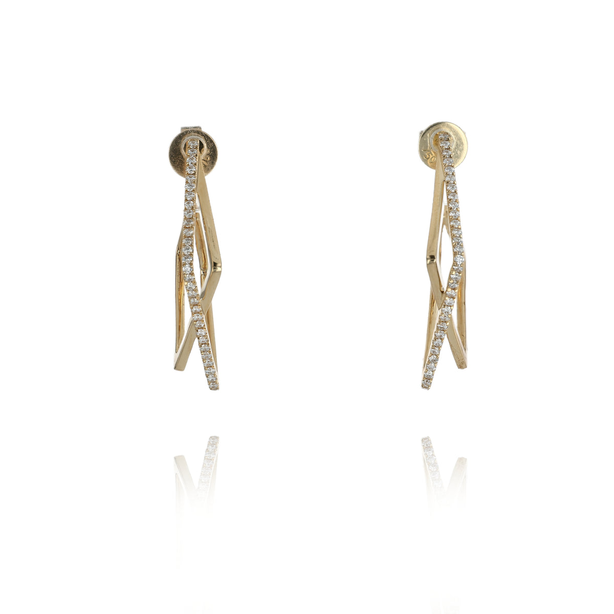 A pair of gold hoop earrings with a twisted, geometric design set with small clear stones, shown against a plain white background with a soft reflection below.