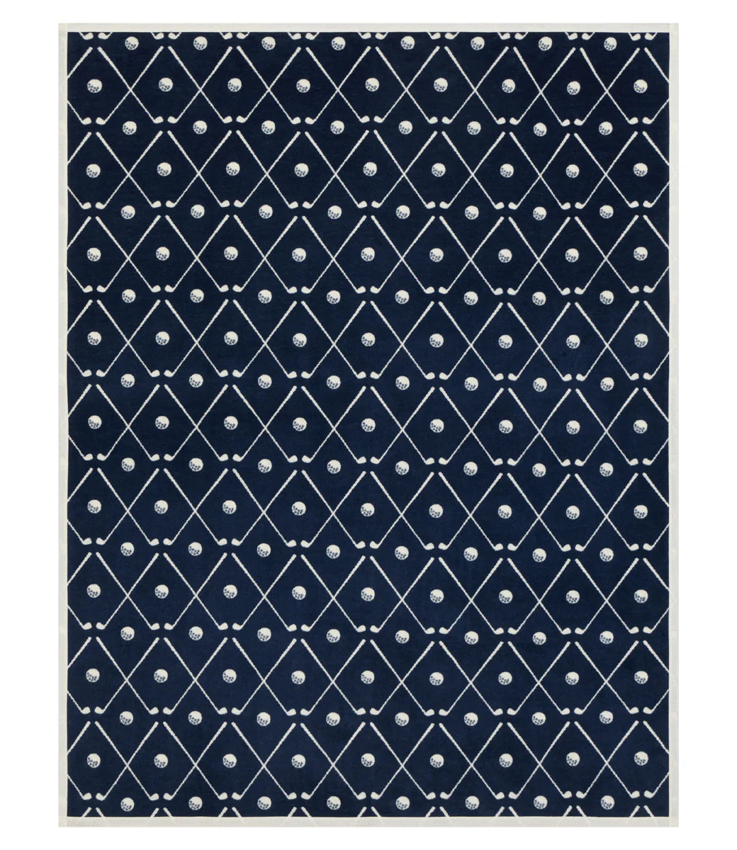 Blue/Navy blanket with blue and white geometric pattern with golf clubs on a white background