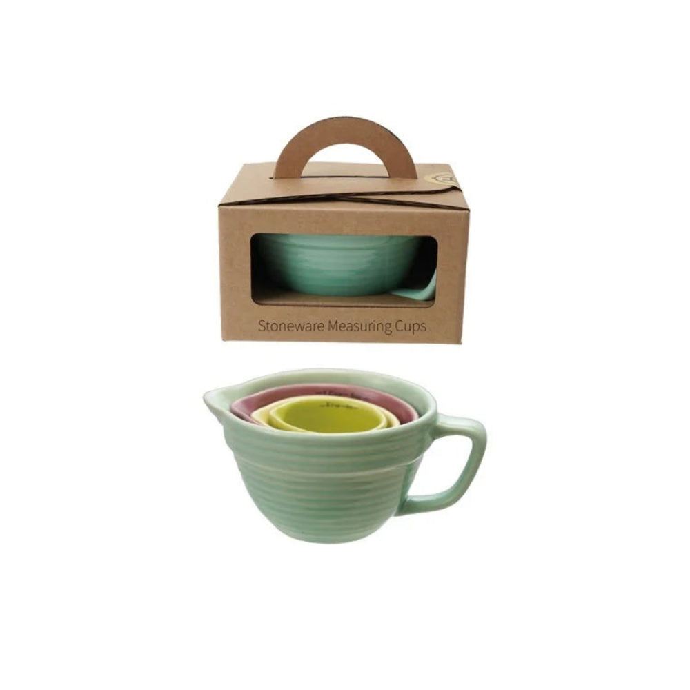 Set of green measuring cups with a cardboard box packaging on a white background.