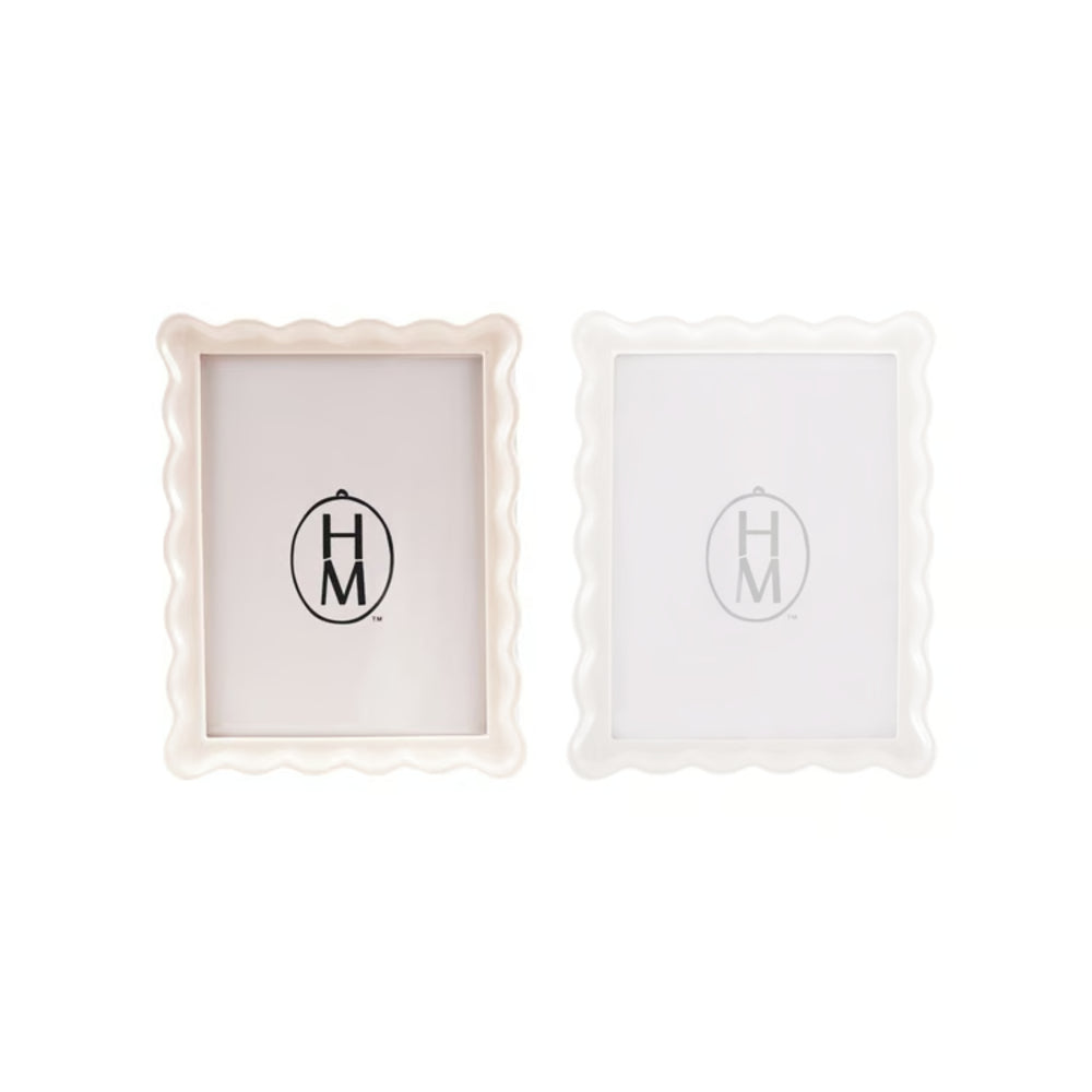 Two decorative frames with 'HM' logo on a white background
