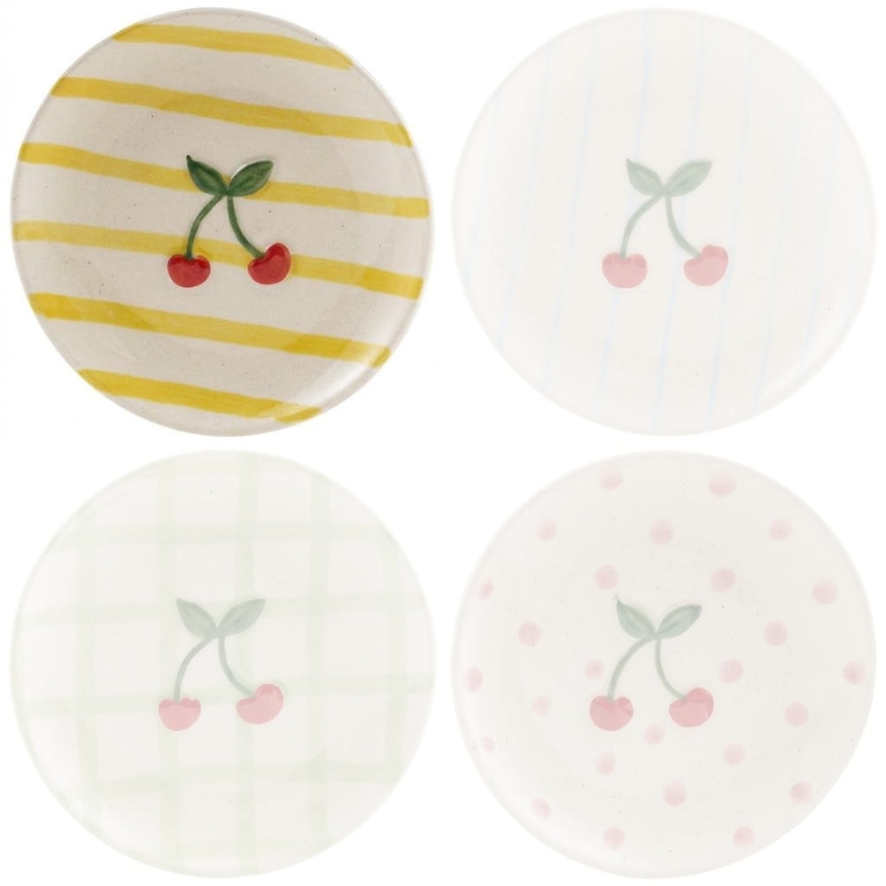 Ceramic plate with cherry a  design on and yellow stripes on a white background.
