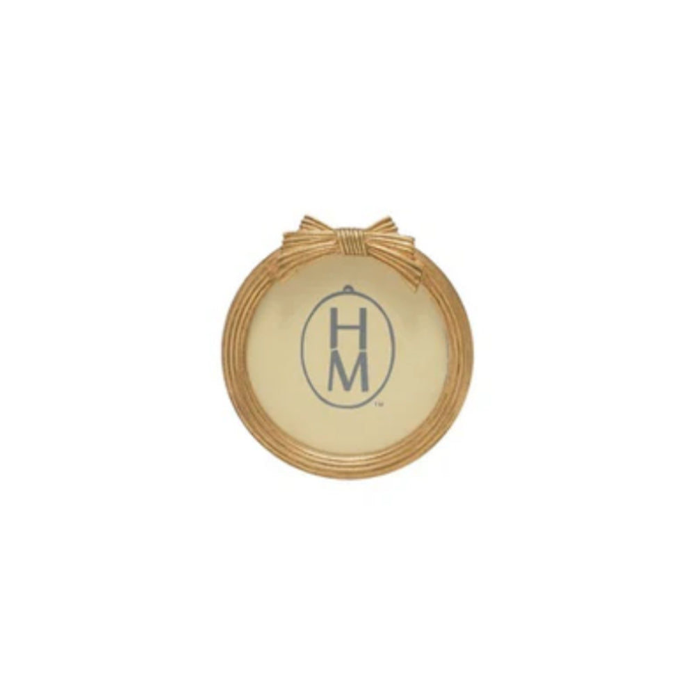 Round decorative gold frame with a gold bow on top on a white background.