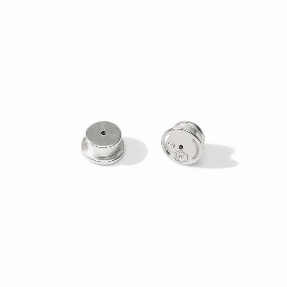 Two silver earrings on a white background