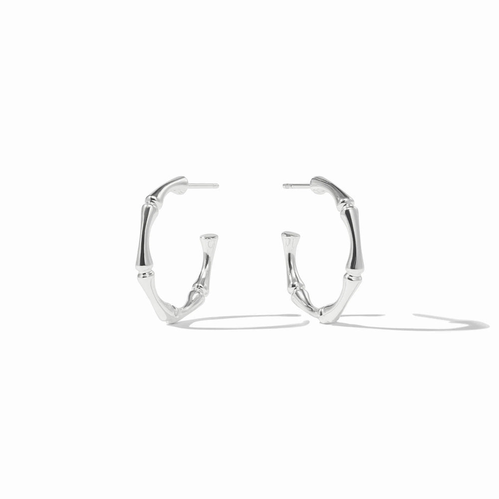 Silver hoop earrings on a white background