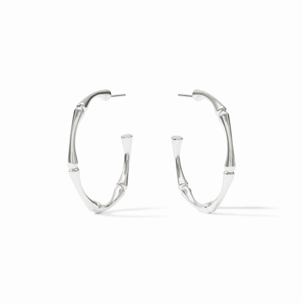 Silver hoop earrings on a white background