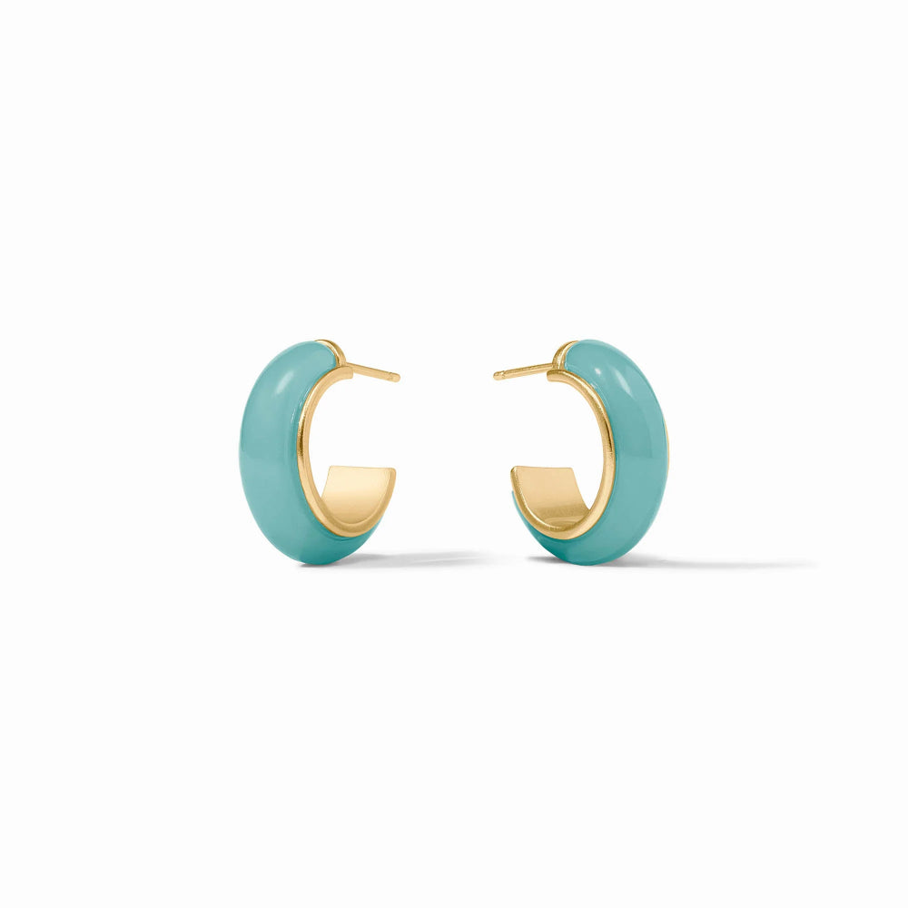 Turquoise hoop earrings with gold accents on a white background