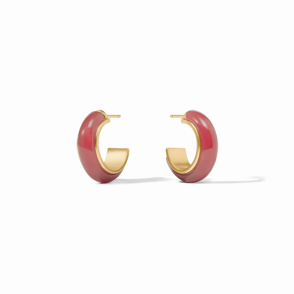 Pair of red hoop earrings with gold accents on a white background