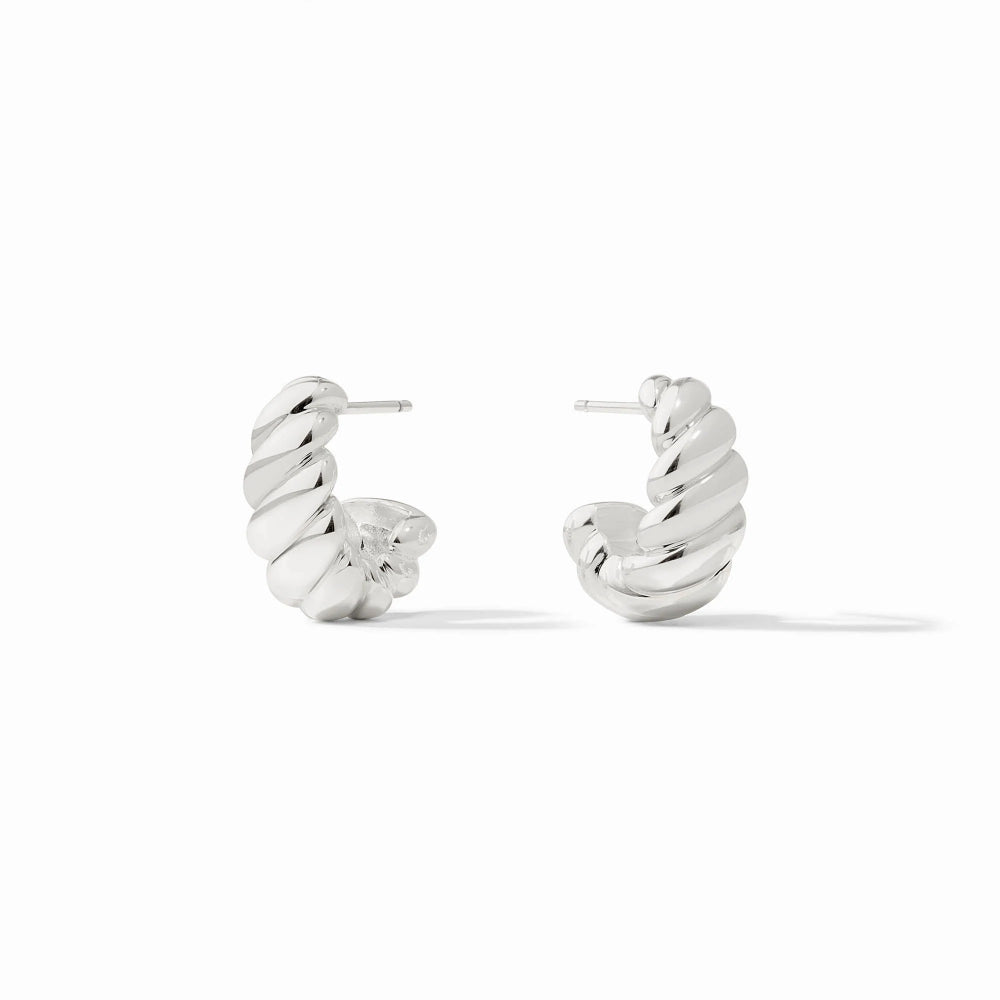 Pair of silver hoop earrings on a white background