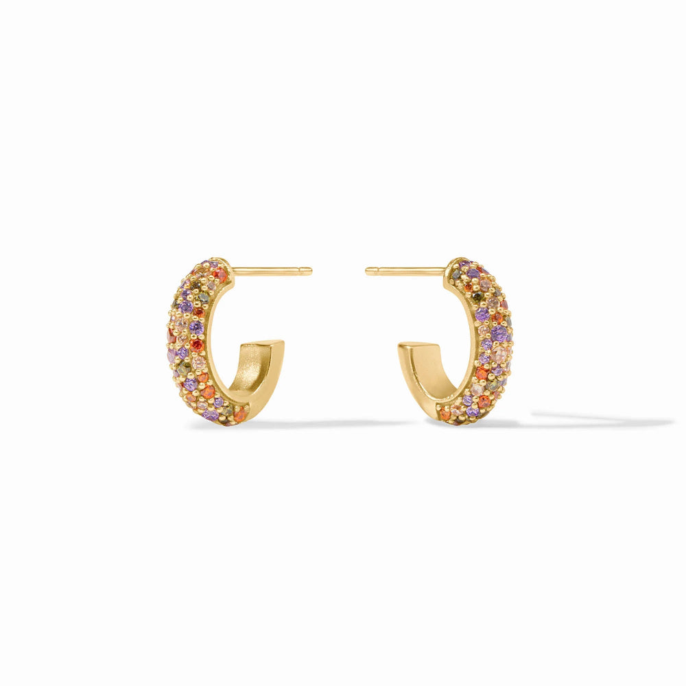 A pair of gold huggie hoop earrings embellished with small multicolored pavé stones, shown on a clean white background.