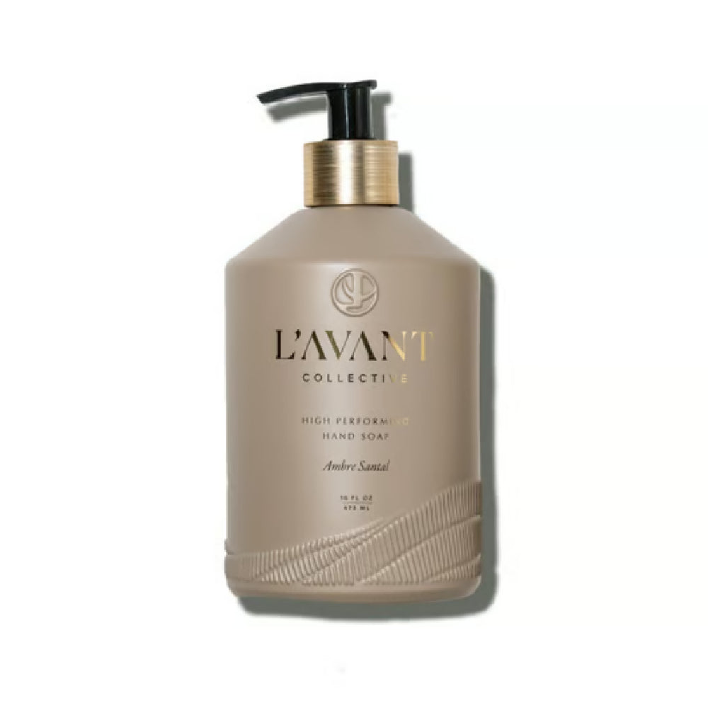 L'Avant Collective Amber Sandal hand soap in a matte taupe pump bottle with a gold collar and black pump, shown on a white background.
