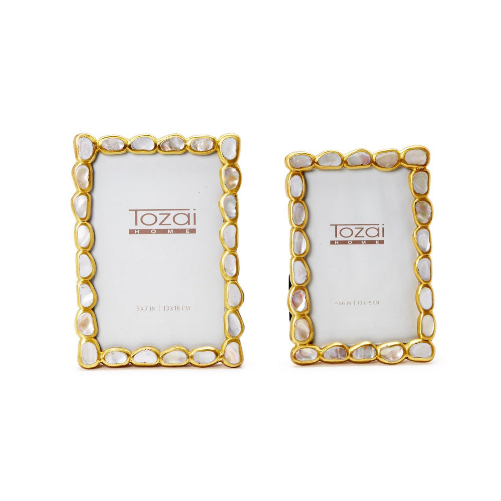 Two gold photo 4x6 & 5x7 frames with shell accents on a white background, featuring the Tozai brand.