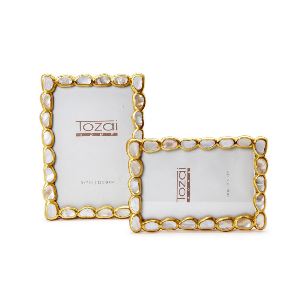 Two gold picture  4x6 & 5x7 frames with shell accents on a white background, featuring the Tozai brand.