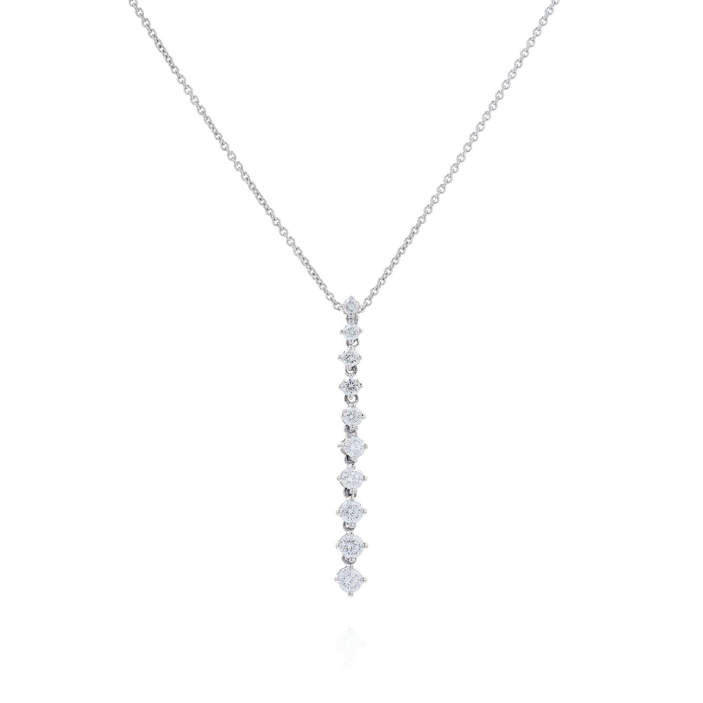 White gold single row graduated diamond pendant necklace on a white background