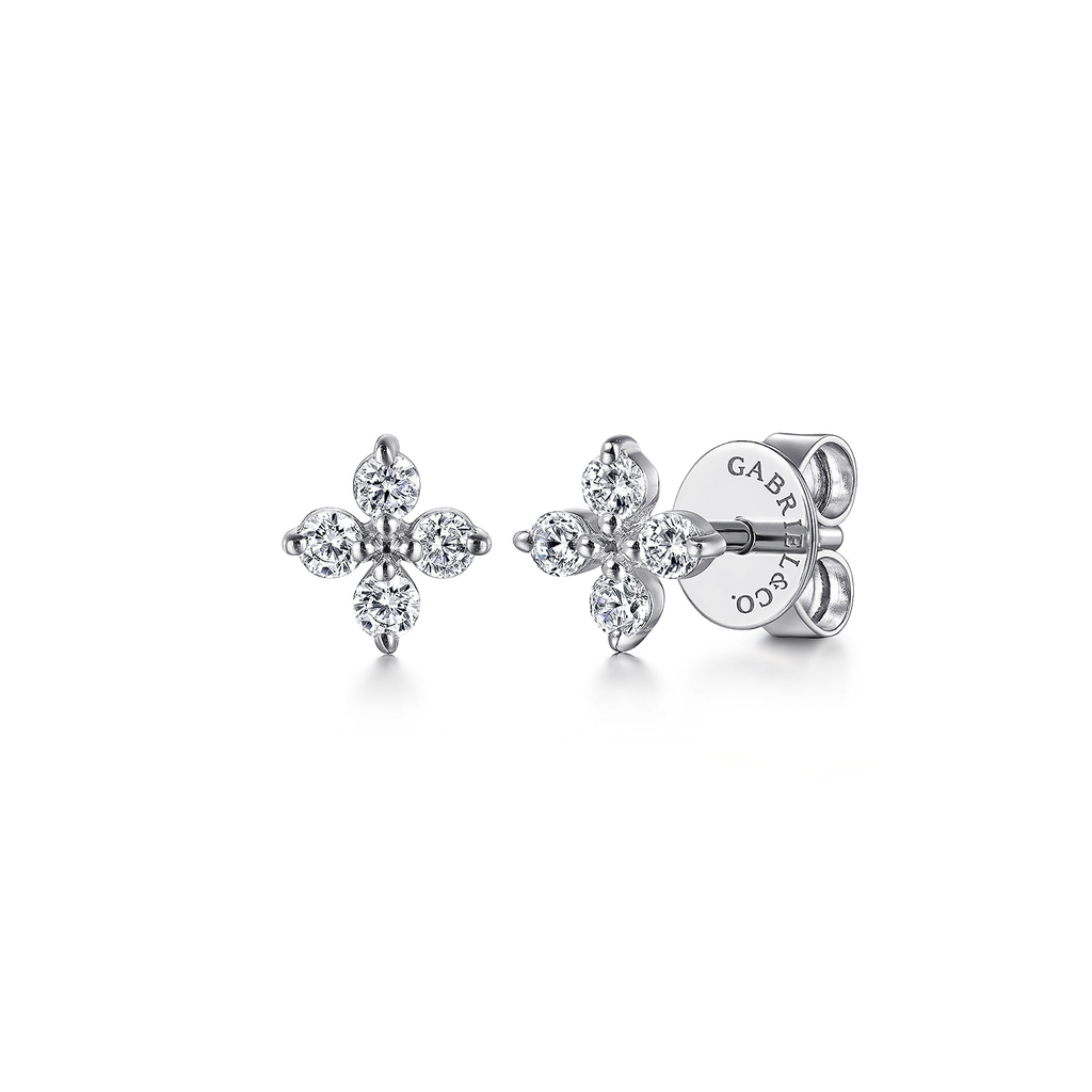clear stone stud earrings on white background