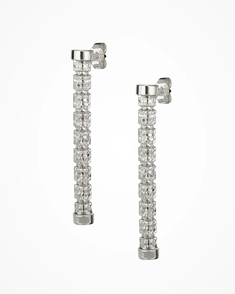 A pair of long drop earrings with tiny cylinders set in silver-toned metal,