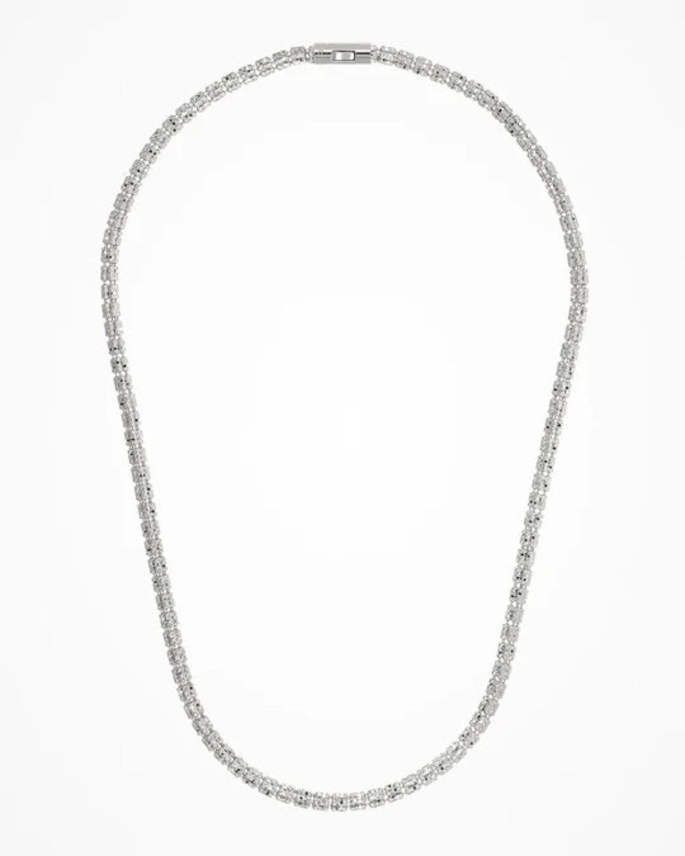 A silver tennis necklace with a continuous line of tiny cylinders ,