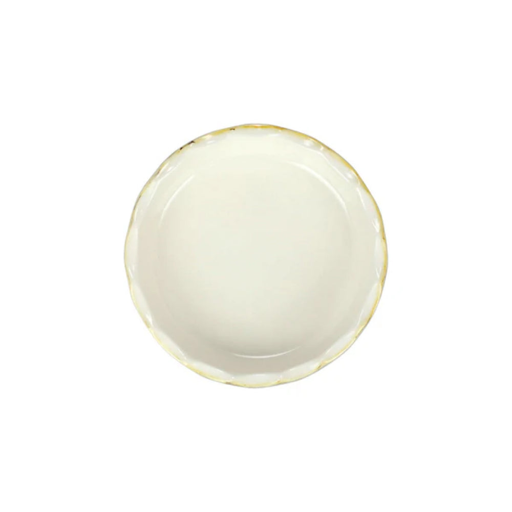 Top view of cappuccino ceramic beige bowl with gold rim on a white background