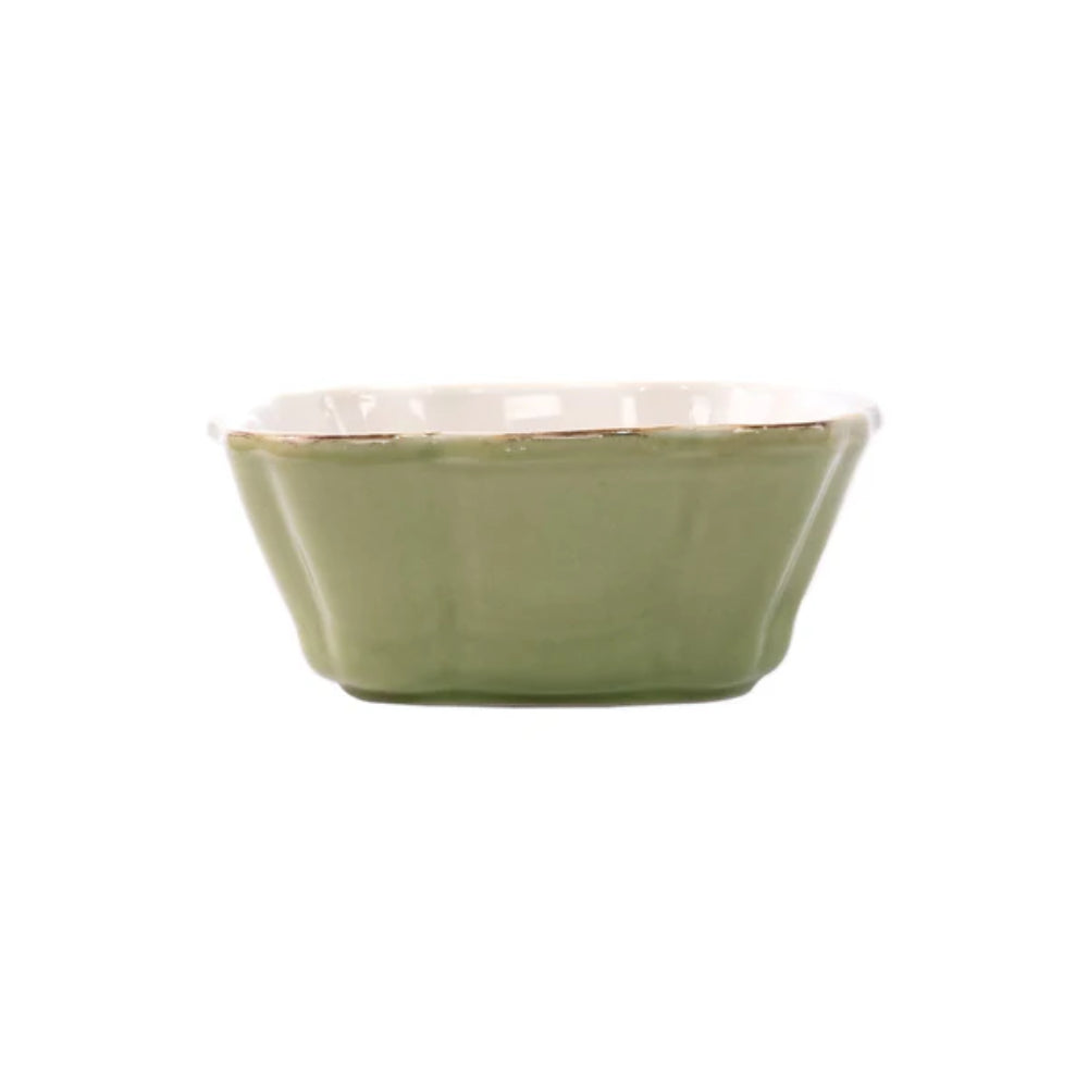 Green ceramic bowl on a white background
