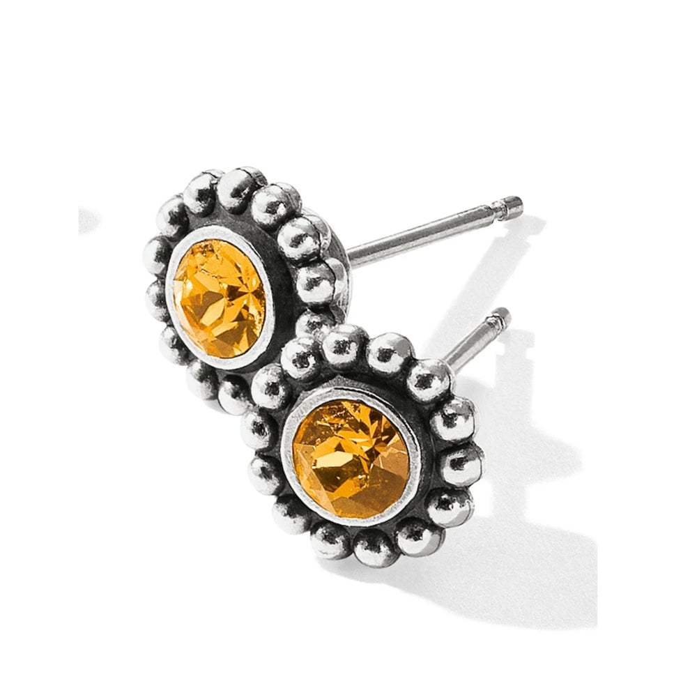 silver stud earring with topaz gemstone
