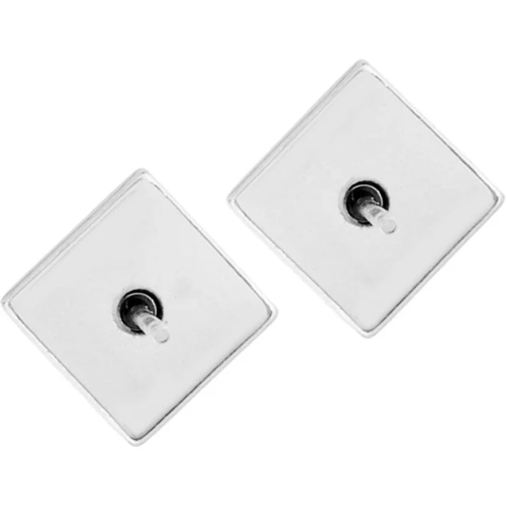 Two white square light switch covers with central black sockets on a white background