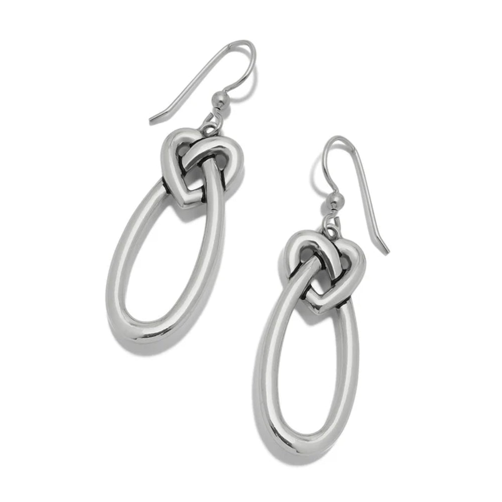Silver knot earrings on a white background