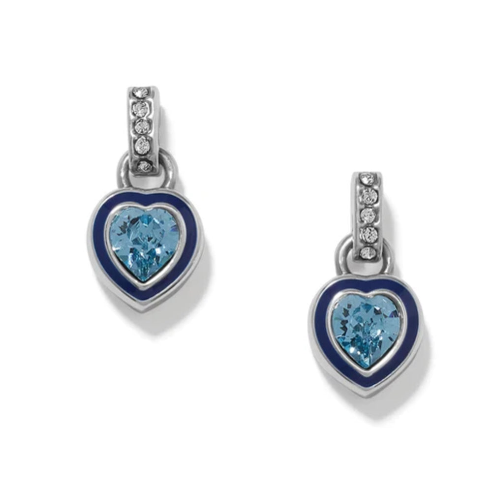 Heart-shaped earrings with blue gemstones and silver accents on a white background