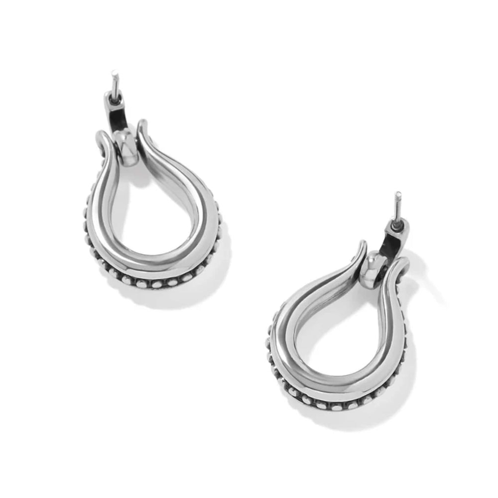 A pair of sterling silver teardrop-shaped drop post earrings with a textured beaded lower border shown on a clean white background.