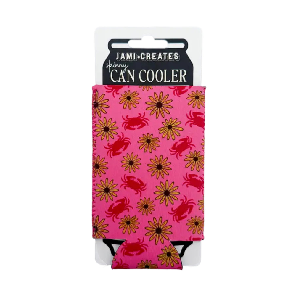 Pink can cooler with crab and flower pattern on a white background