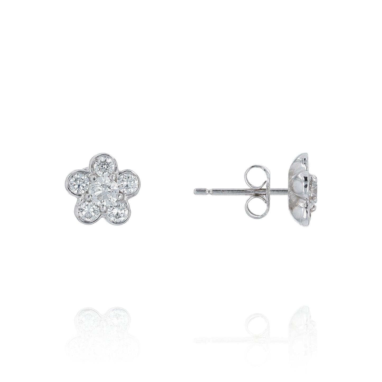 Flower-shaped white gold earrings with diamond accents on a white background