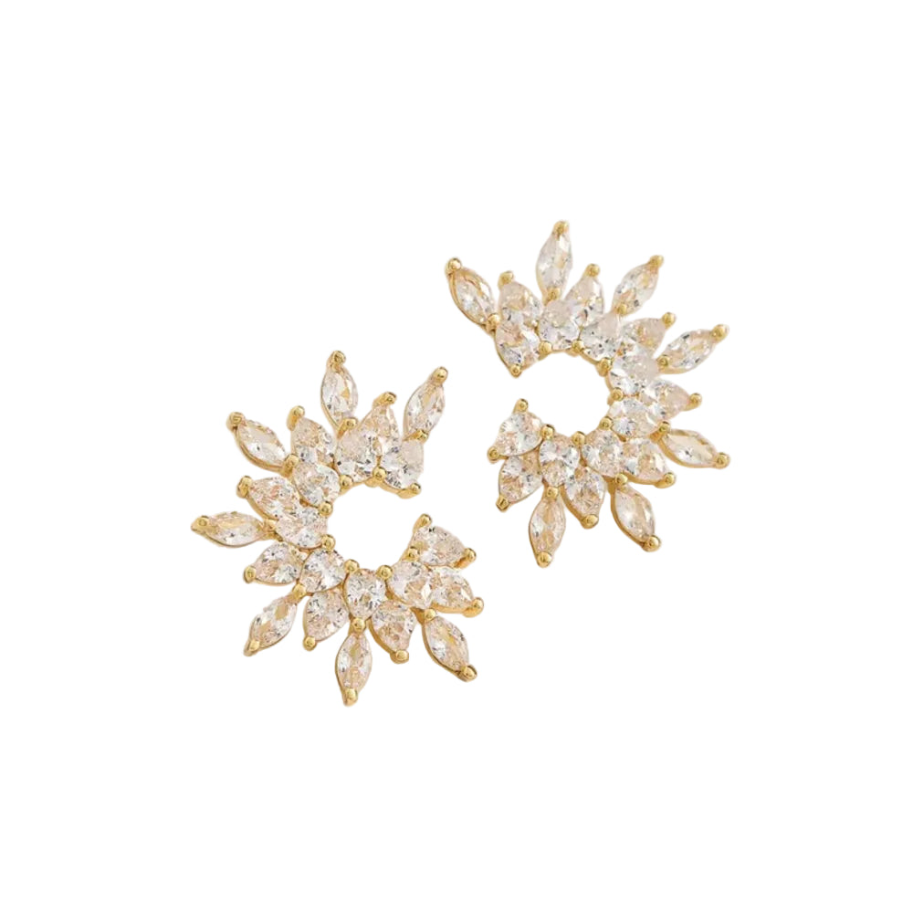 A pair of gold-toned stud earrings with marquise-cut clear crystals arranged in a sunburst or flower-like cluster, photographed on a clean white background.