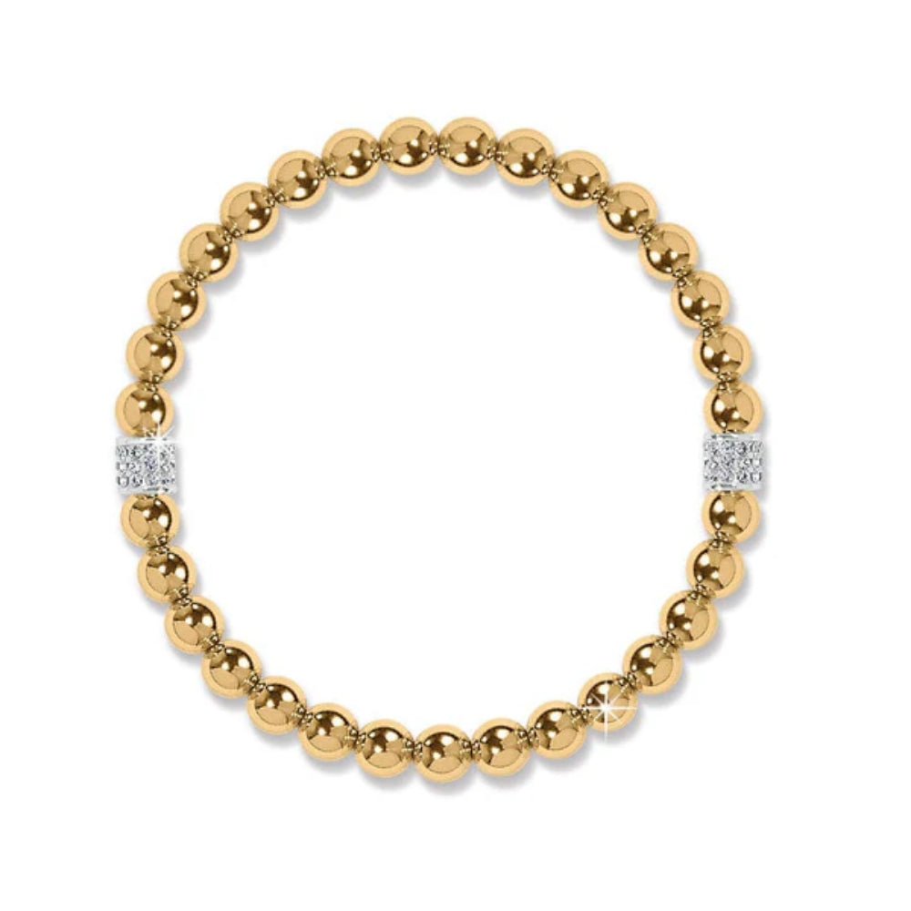 Gold beaded bracelet with diamond accents on a white background