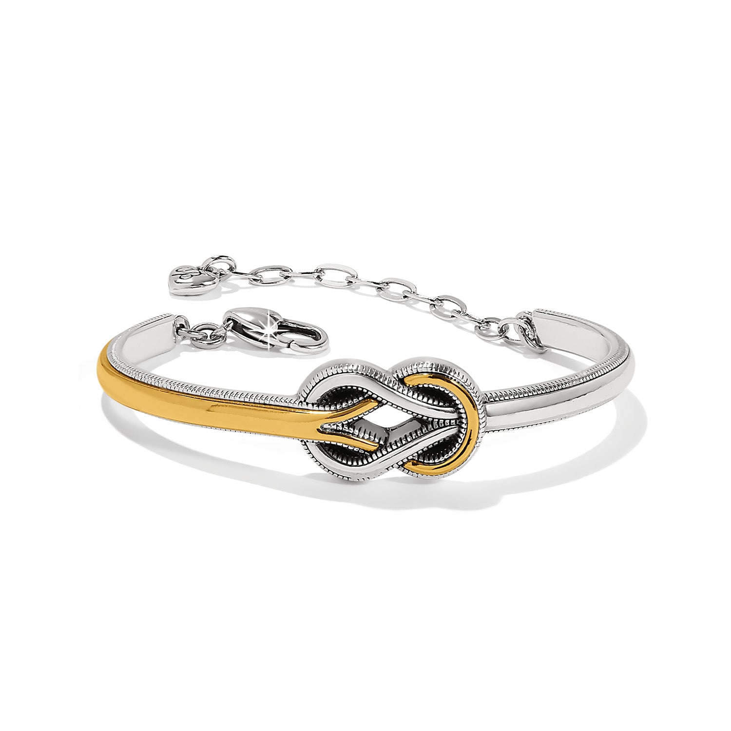 A two-tone (silver and gold-colored) Brighton Interlok Harmony bar bracelet on a white background.