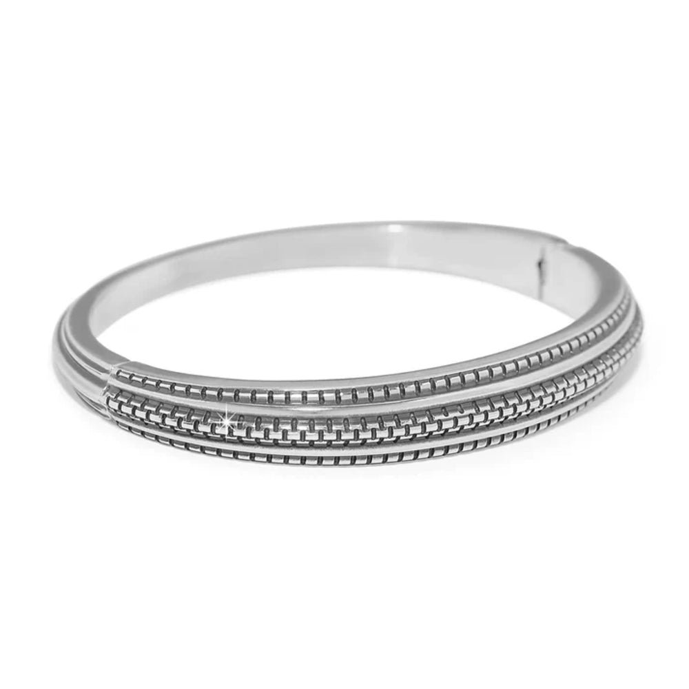 Silver bangle on a white background