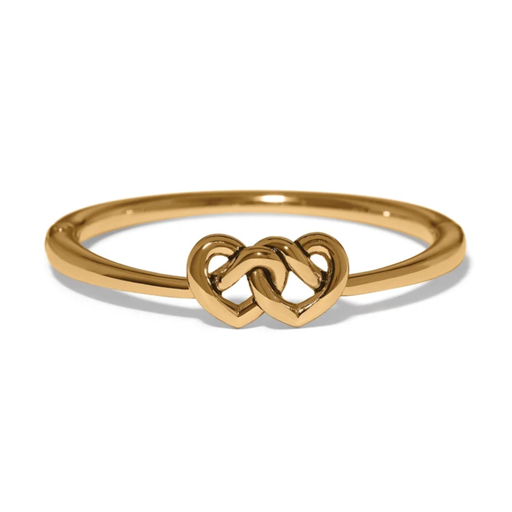 Gold bangle with a double heart design on a white background