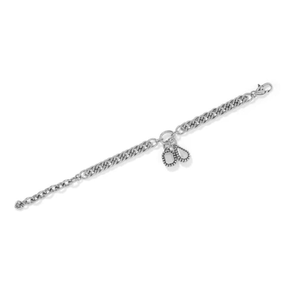 A silver chain bracelet with a lobster clasp and a small heart-shaped charm, displayed diagonally on a clean white background.