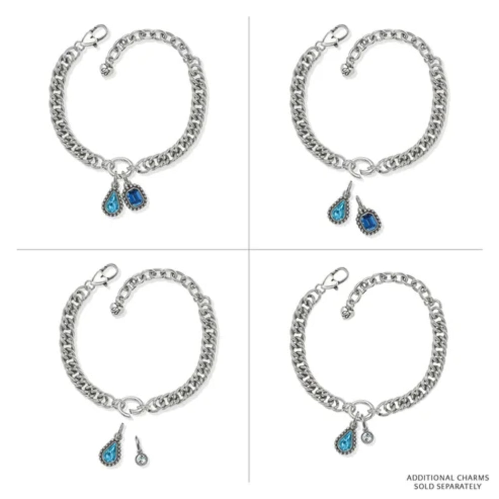 Four views of a silver chain bracelet with two teardrop charms, shown on a white background. Two bracelets feature blue teardrop charms with silver crystal detailing, and two feature a single silver teardrop charm with a clear crystal.
