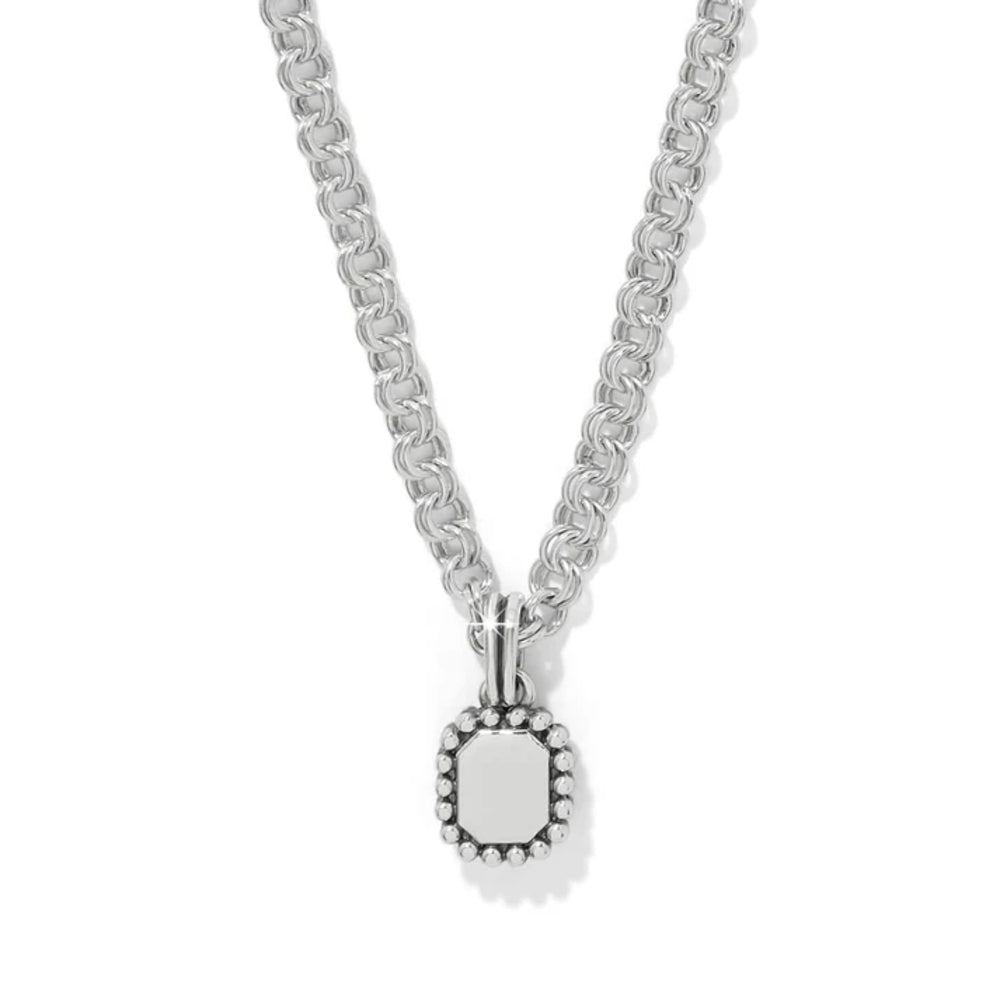 Silver necklace with a pendant on a white background