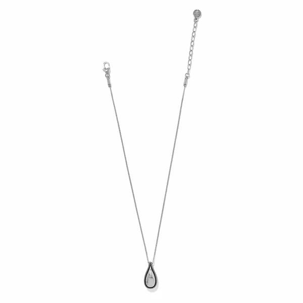 Silver necklace with a teardrop-shaped pendant on a white background